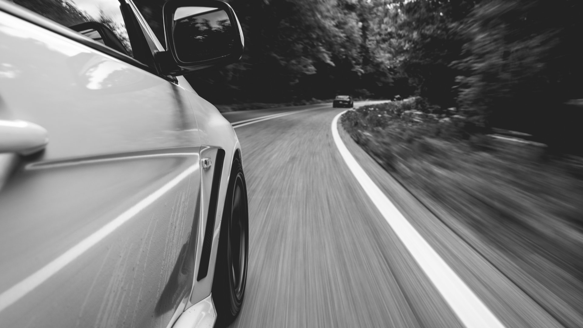 Caleb's Evo in a rolling shot through the Ozarks